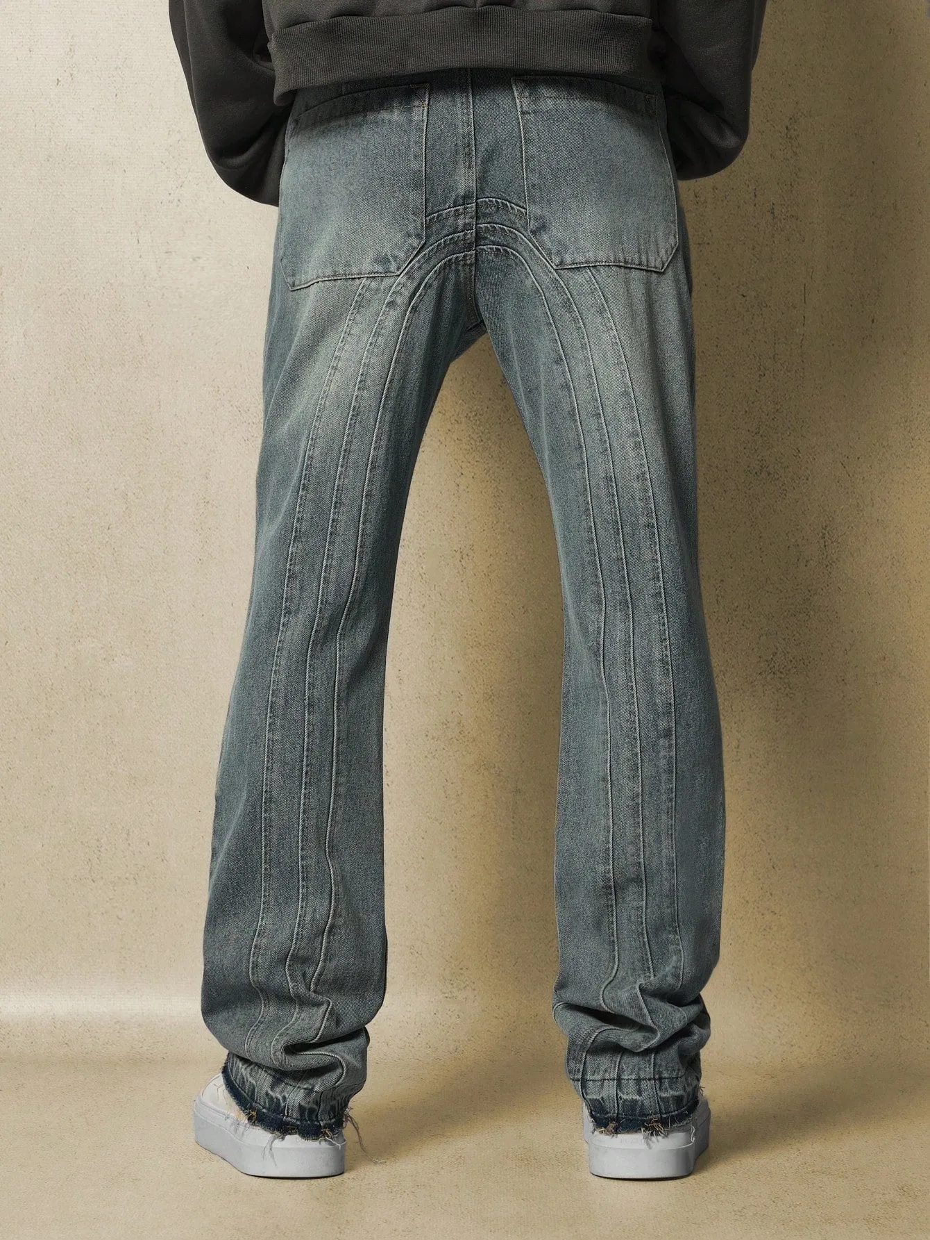 Flare Fit Raw Edge Jean With Decorative Stitch