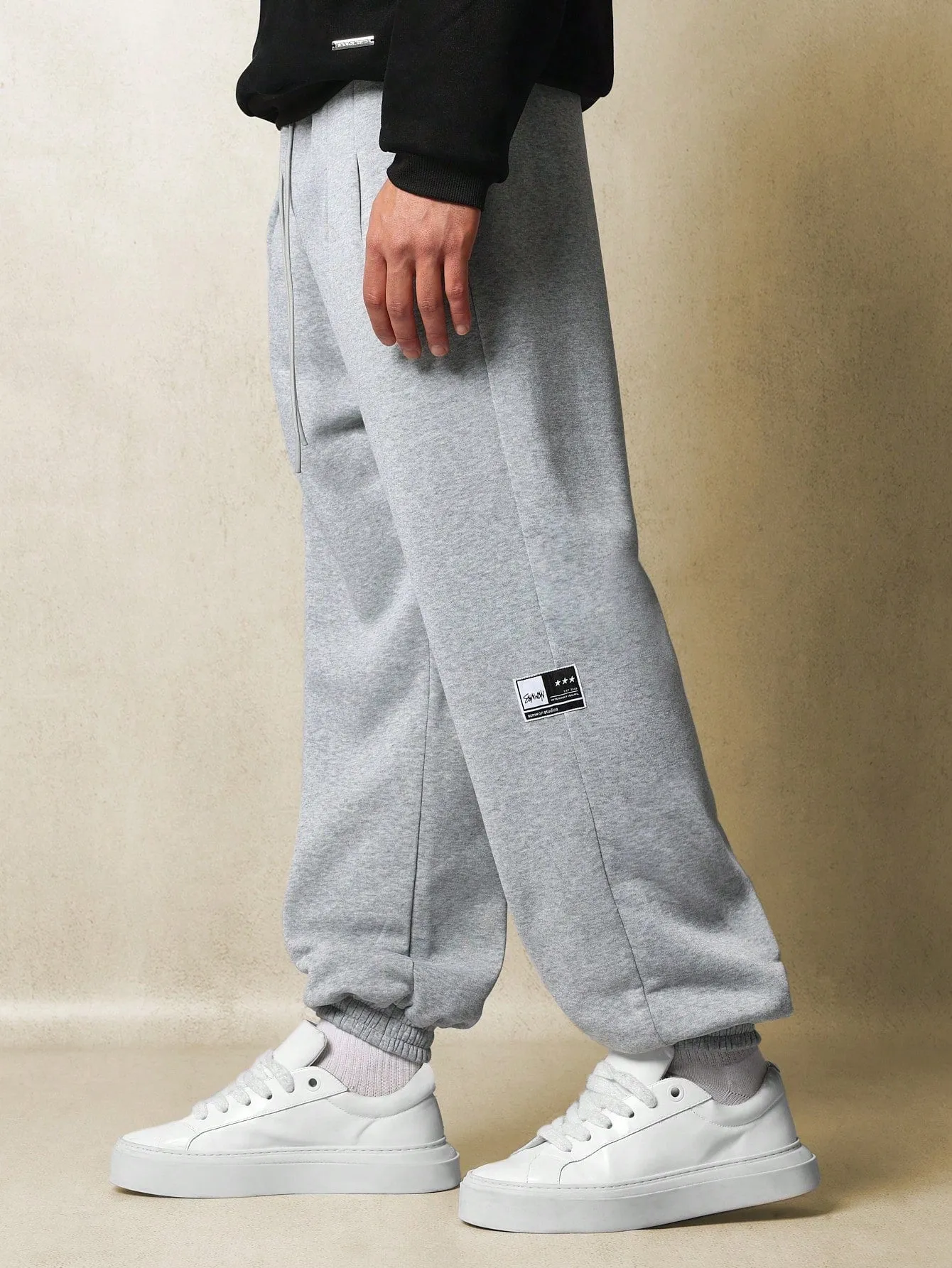 Loose Fit Jogger With Pleats And Cuffed Hem