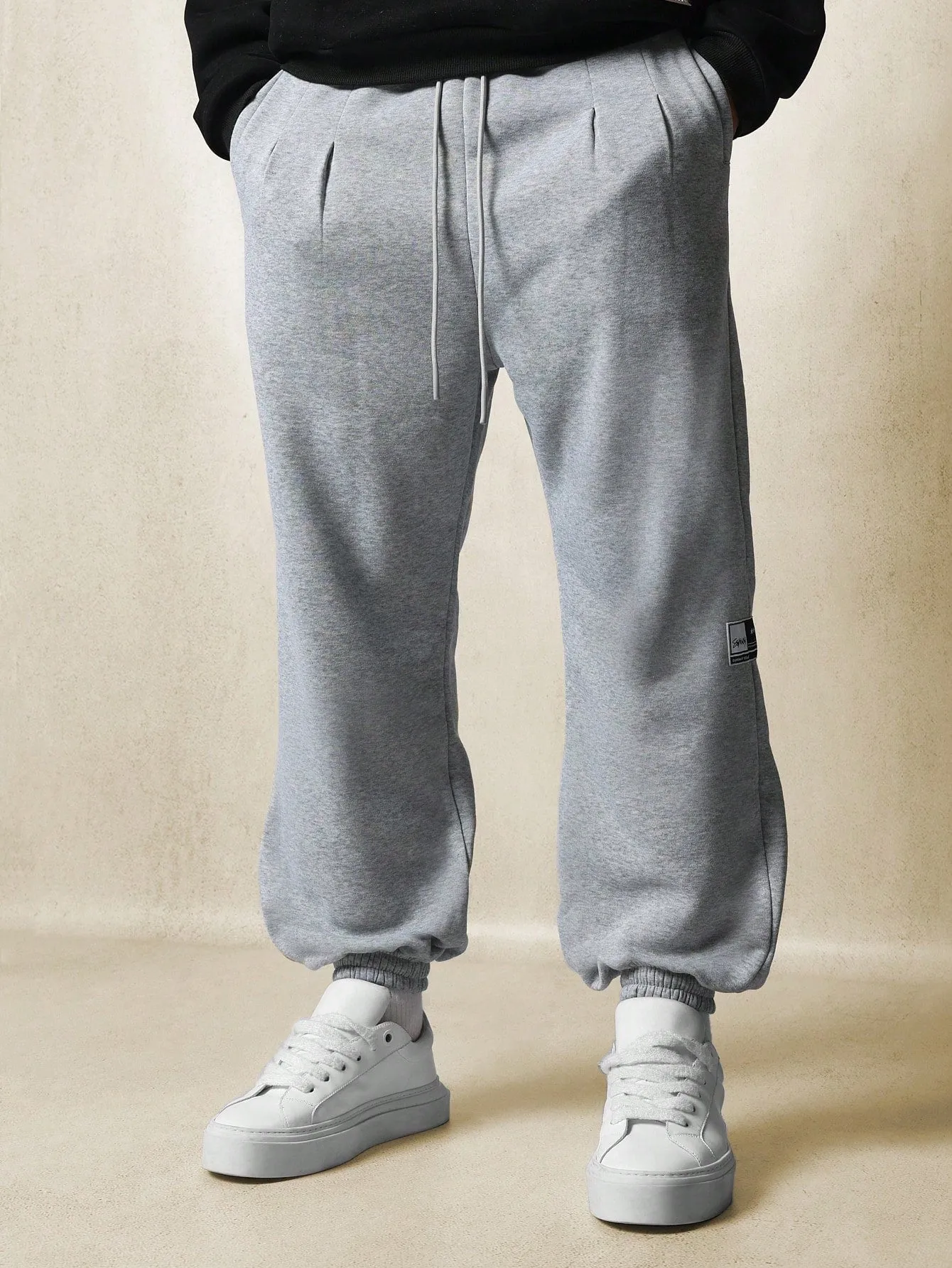 Loose Fit Jogger With Pleats And Cuffed Hem